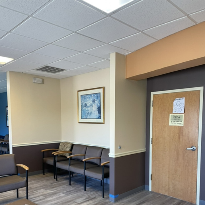 Office waiting room interior after commercial property repair and renovation project